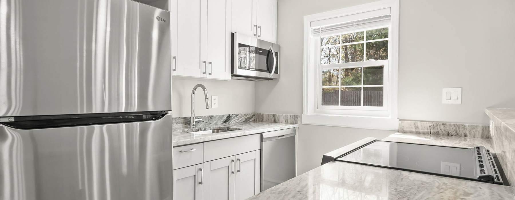 The kitchen with white cabients